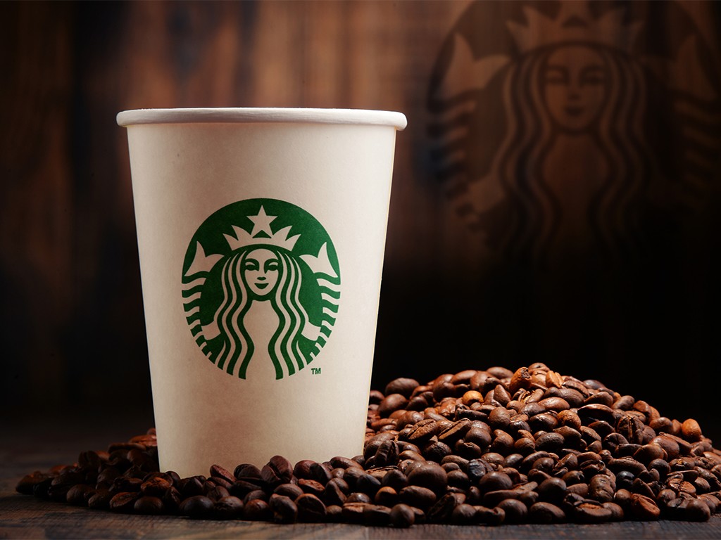 starbucks cup and coffe beans